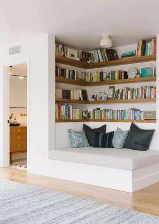 20 Floating Shelf Design Ideas To Transform Your Home 22 Create a Reading Nook with a Corner Floating Shelf