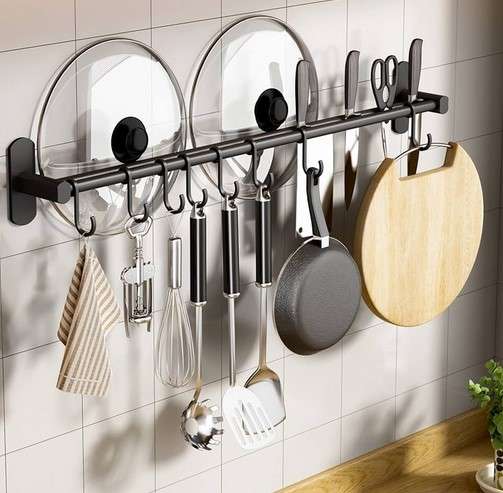 Creative Solutions: 12 Clever Kitchen Storage Ideas for Small Spaces 17 Hang Pans and Utensils From the Wall