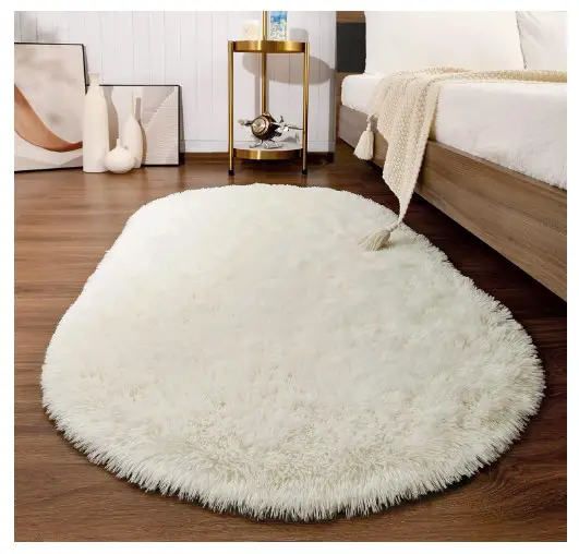 7 Affordable Cozy Bedroom Rugs Under $100 5 Softlife Fluffy Rugs for Bedroom, Shag Cute Area Rug for Girls/Boys and Kids Baby Room Home Decor, 2.6 x 5.3 Feet Oval Indoor Carpet for Nursery Dorm Living Room, Creamy