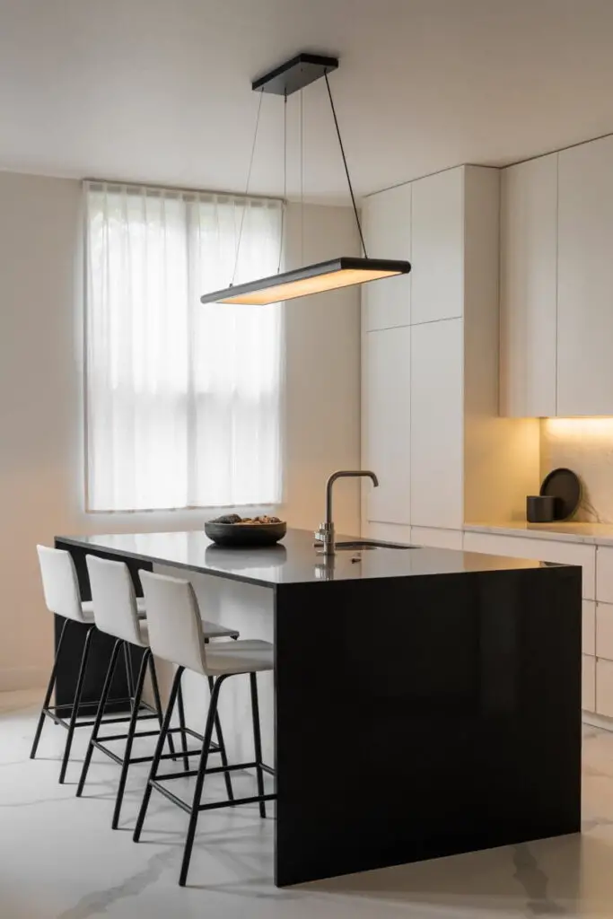 How to Design a Luxury Kitchen with a Bold Black and White Theme 14 Make Your Island the Star